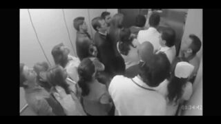 Doctor Groping Nurse In Elevator Full Of People