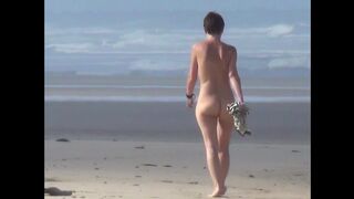 Girl with nice ass walking on European beach 3