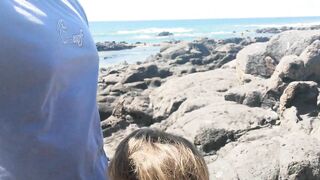 Exciting blowjob in public with people on the beach