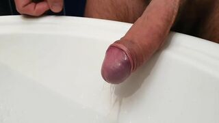 A good pee in the sink and a cock to suck