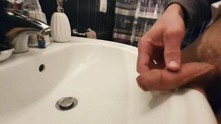 A good pee in the sink and a cock to suck