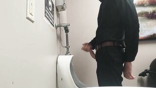 Pissing at public urinal and jerk off before someone comes in