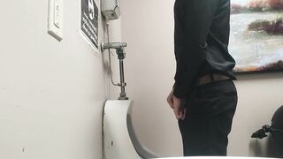 Pissing at public urinal and jerk off before someone comes in