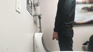 Pissing at public urinal and jerk off before someone comes in