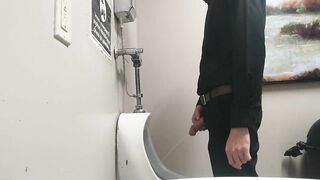 Pissing at public urinal and jerk off before someone comes in