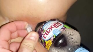 Pounding her pussy with a bottle while I fill her arse with Columbia substance