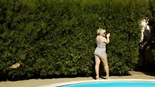 Gorgeous lady by the pool