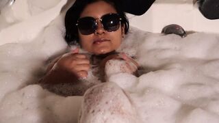 Busty Latina mischief in the hot tub