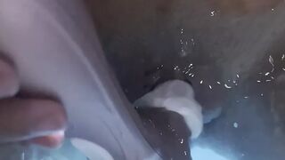 Jasmine masturbates the clitoris with a waterproof sex toy in the jaccuzy