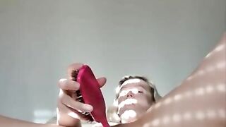 Busty blonde fucks her pussy with a hairbrush