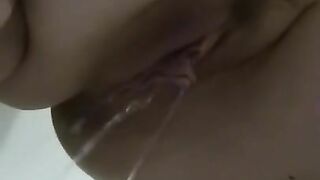 Sexy Milf with nice pussy farting and pissing in the same time in bathtub.