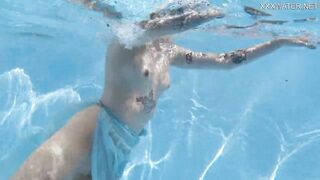 Finnish blonde tattooed pornstar Mimi underwater