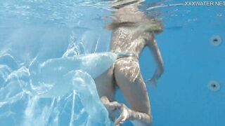 Finnish blonde tattooed pornstar Mimi underwater