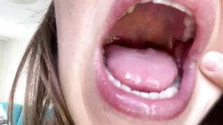 Wild open mouth. Giantess vore fetish. Teeth, tongue close view