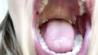 Wild open mouth. Giantess vore fetish. Teeth, tongue close view