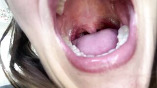 Wild open mouth. Giantess vore fetish. Teeth, tongue close view