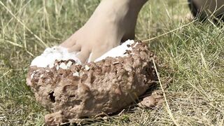 Smashing a cake with my feet. The chocolate and cream gateaux feels so nice between my toes