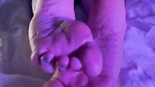 Wrinkled Soles Covered in Cum After a Footjob