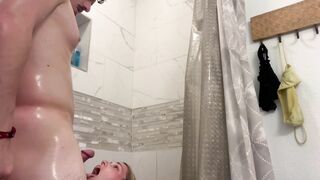 Blonde teen in the shower takes a cumshot to the face