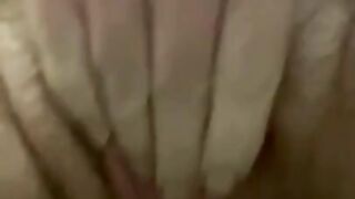 Fingering my hairy pussy while I piss on my hand