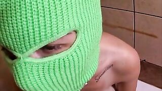 Ski mask girl smoking a cigarette and sucking cock