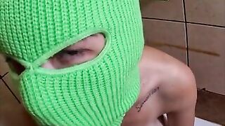 Ski mask girl smoking a cigarette and sucking cock