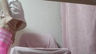 A slender Japanese girl starts masturbating