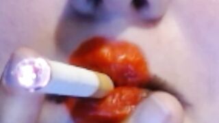 Red Heart Lipstick And Smoking Upclose