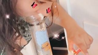 Caramel Shizzle rips bong in hot weed outfit