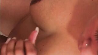 hot wife plays with my penis between her tits, she gives me a handjob and I cum on her tits in the b