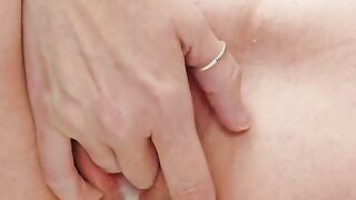 Fingering and Spasming Pink Pierced Pussy