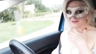 Slutty girl shows her tits in the car in public