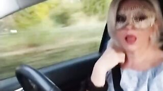 Slutty girl shows her tits in the car in public