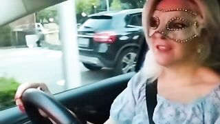 Slutty girl shows her tits in the car in public