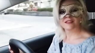 Slutty girl shows her tits in the car in public