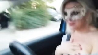 Slutty girl shows her tits in the car in public