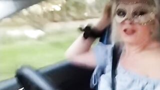 Slutty girl shows her tits in the car in public