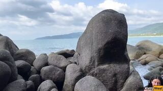 Naked Brunette Masturbates with Oil on a Beach